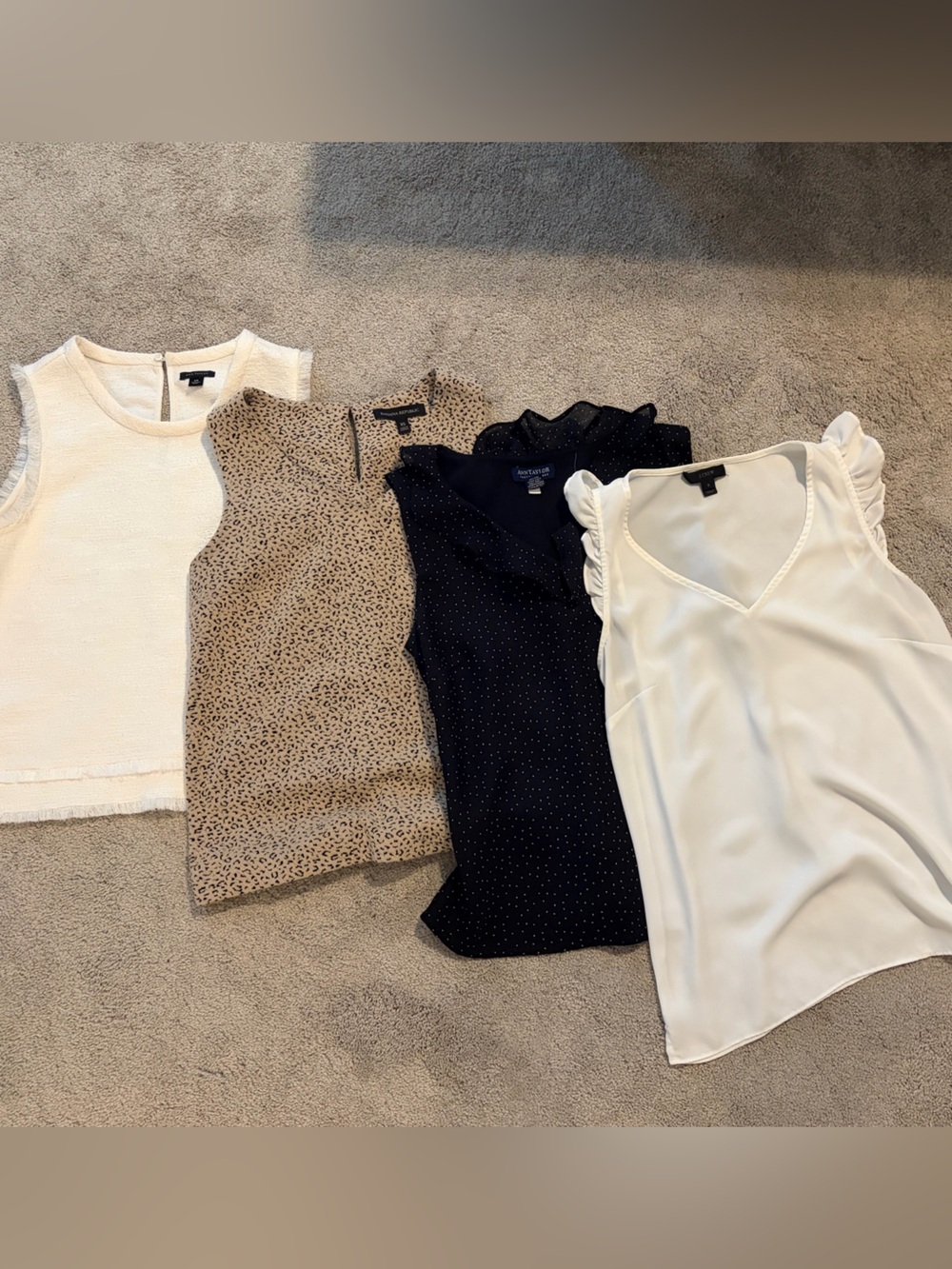 Bundle of women’s sleeveless dress shirts